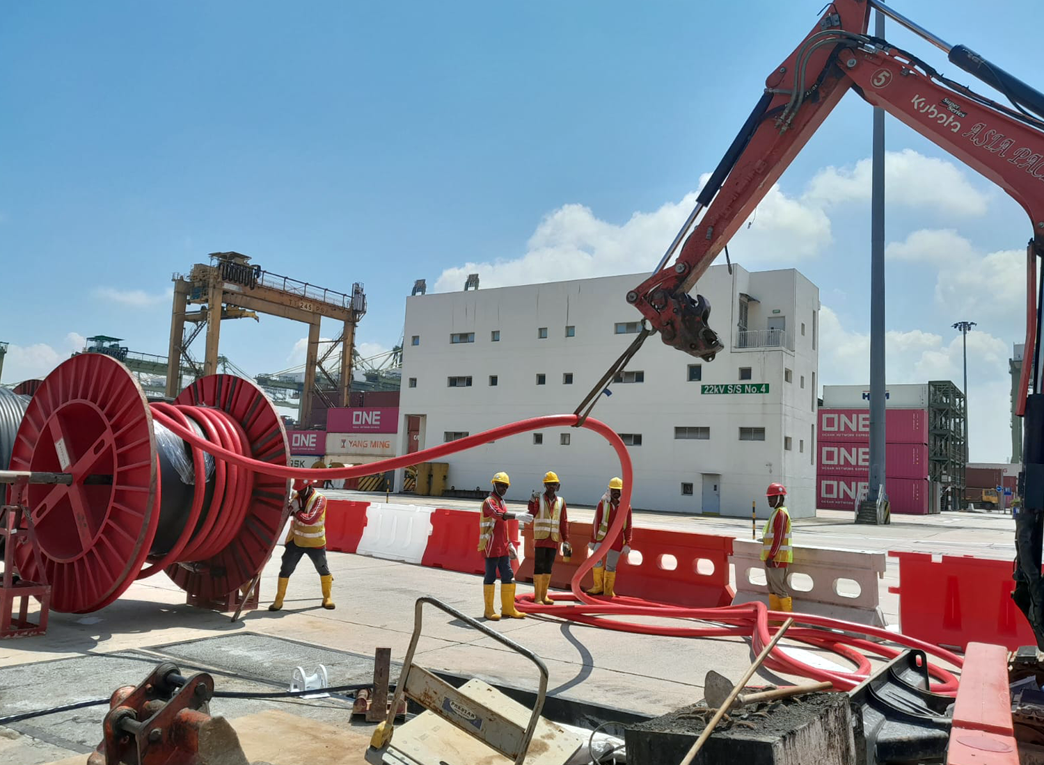 Cable pulling work through underground ducts for power and telecom installation in Singapore